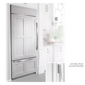Built in refrigerator with a framed cabinet style overlay