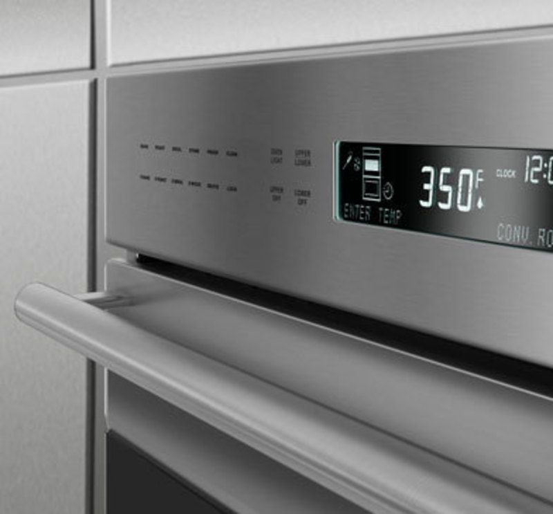 Wolf Appliance, Inc.: E Series Built-In Wall Ovens, Unframed Door Style Close up view of an e-series oven showing control panel and LCD display