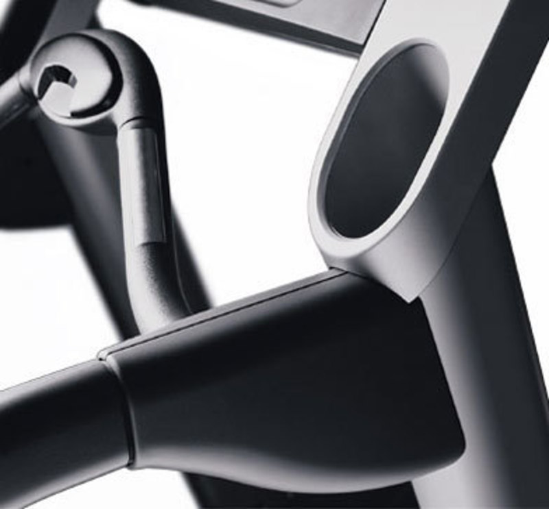 Life Fitness: Classic Series Treadmill Close up detail view of the cup holder and side rail