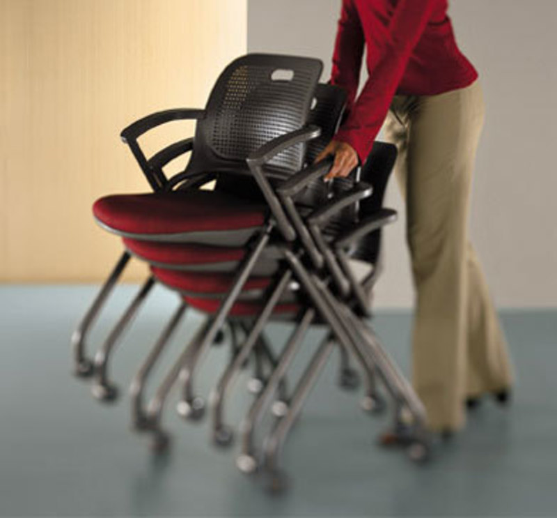 Allsteel Inc.: Get Set Chair Image showing a user pushing a stack of Get Set Chairs