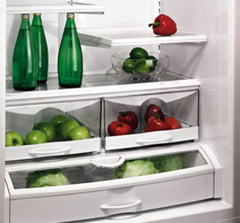 Three quarters front view of the production version showing produce and water in the refrigerator