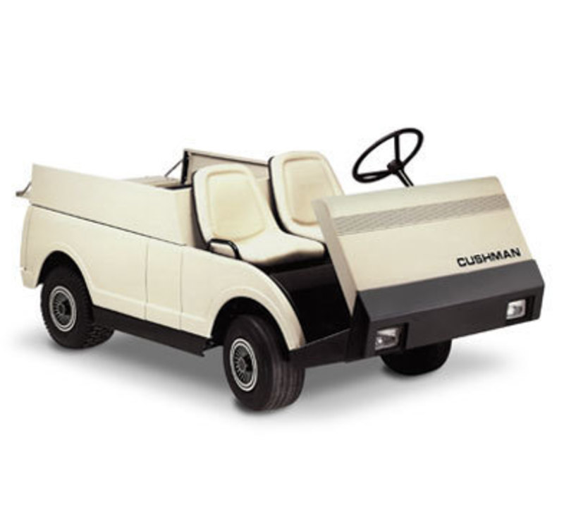 Three quarters front view showing that final design of the Cushman utility vehicle with a dump bed