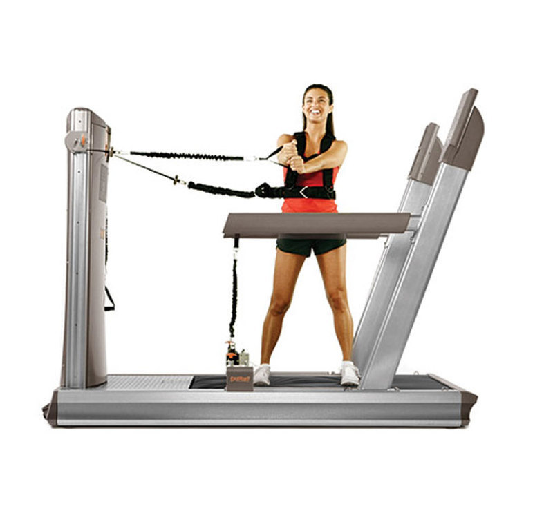 Sproing: Soft-Platform Training Machine The soft platform training machine with a person engaged in a extension exercise