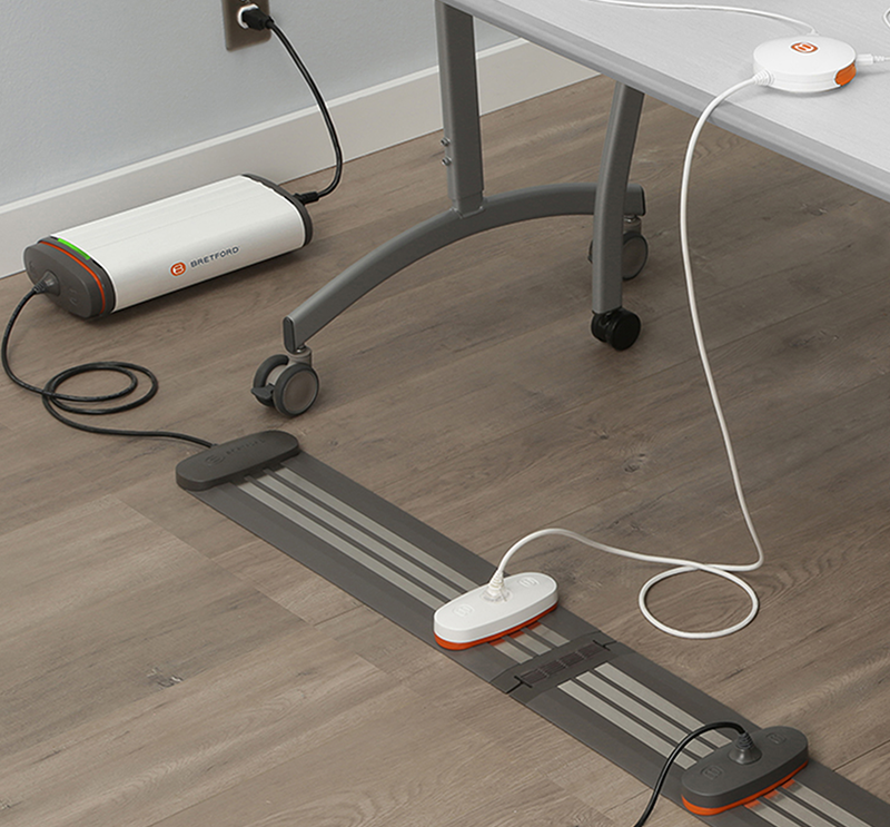 Bretford Manufacturing, Inc.: Juice Mobile Power In context view of the Juice Mobile Power system integrated into a room and table