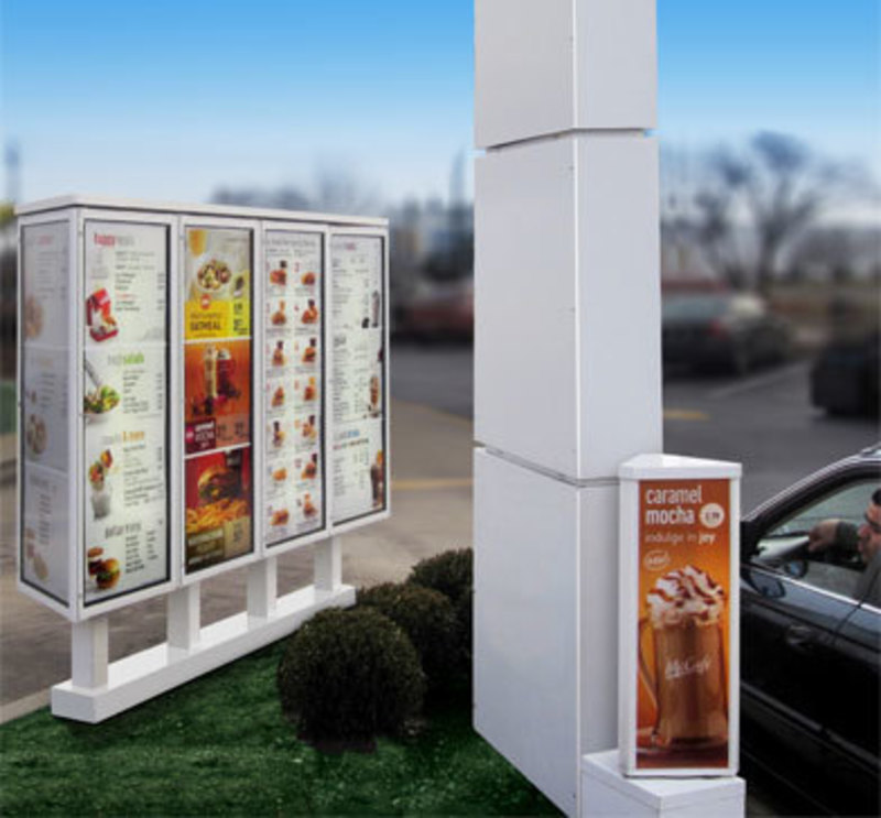 View of the menu boards in a drive-through lane from the vehicle’s perspective