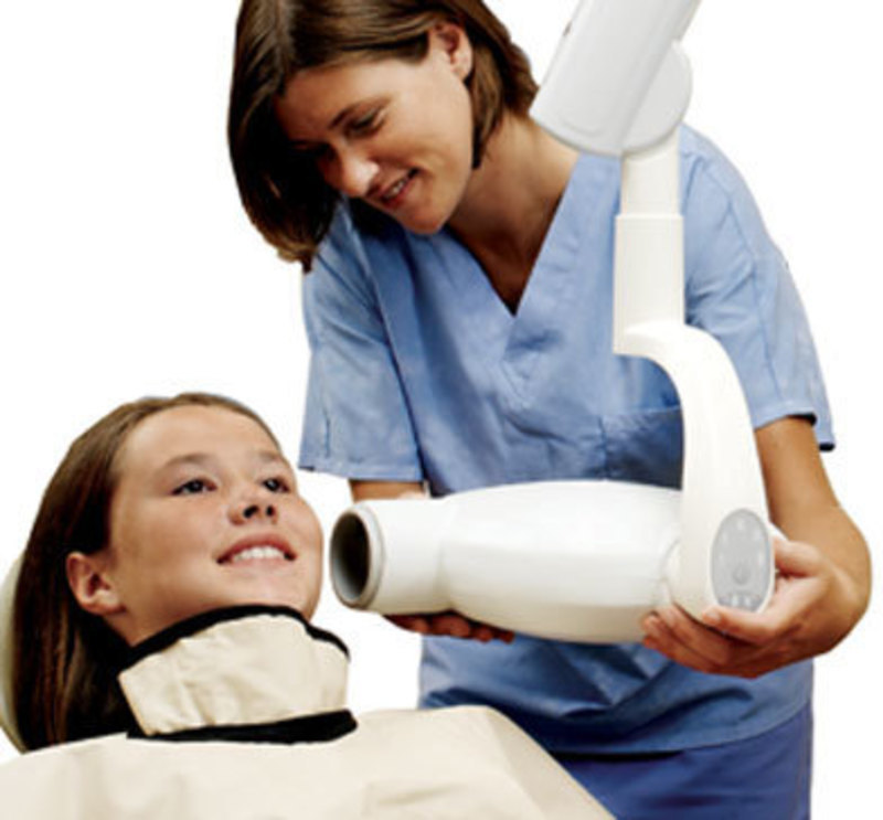 Gendex Dental Systems (KaVo): Expert DC Intraoral X-RaySystem The Expert DC system being used to take an oral x-ray
