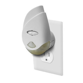 Three quarters view of the glade scented oil plugin plugged into a wall outlet